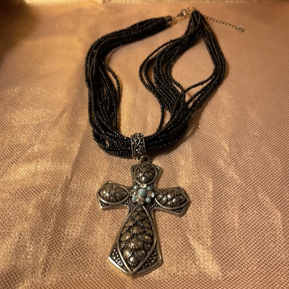 Black multi stranded beaded necklace with silver cross pendant. - Picture 4 of 6
